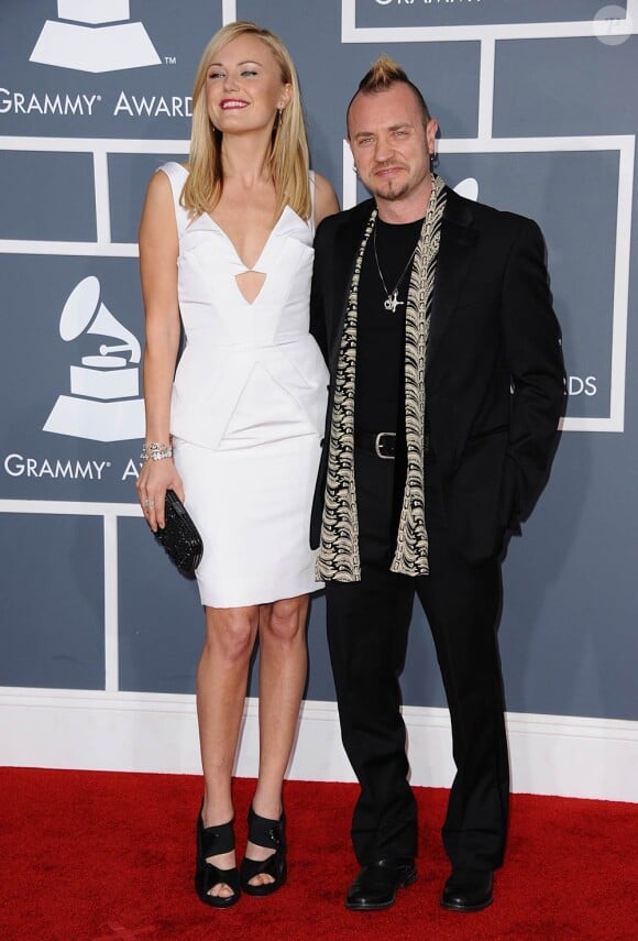 Malin Akerman et son mari Roberto Zincone sur le tapis rouge de la cérémonie des 54e Grammy Awards au Staples Center de Los Angeles le 12 février 2012. Les stars étaient nombreuses à être venues accompagnées pour la grand-messe des récompenses musicales américaines.