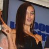 Irina Shayk tape du marteau pour annoncer la fin de la séance au New York Stock Exchange. New York, le 14 février 2012.