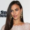 La superbe Irina Shayk, habillée d'une robe courte en dentelle, brillait à l'entrée du club Pure au Caesars Palace pour la soirée Sports Illustrated. Las Vegas, le 16 février 2012.