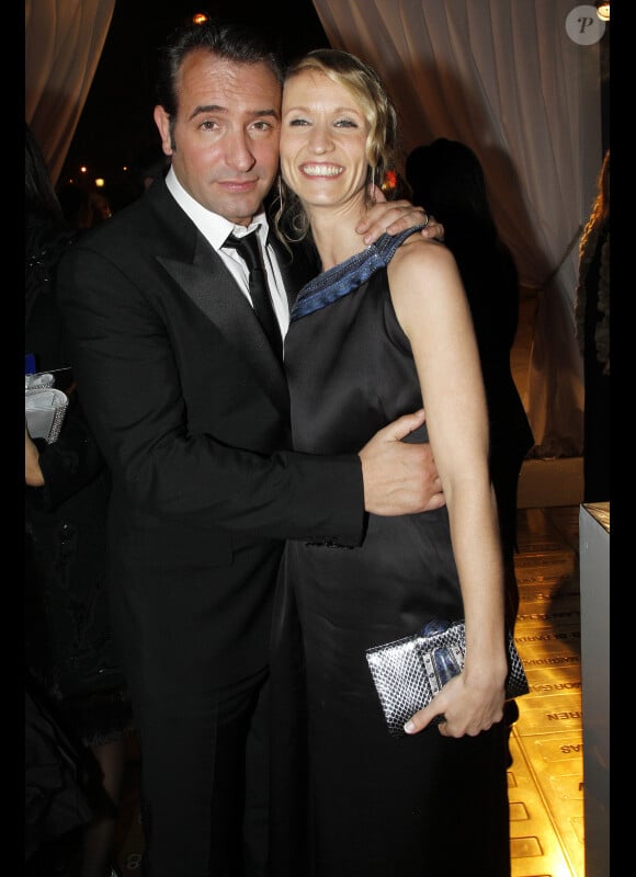 Alexandra Lamy et Jean Dujardin lors de l'after-party de la 37ème cérémonie des César au Fouquet's, le 24 février 2012