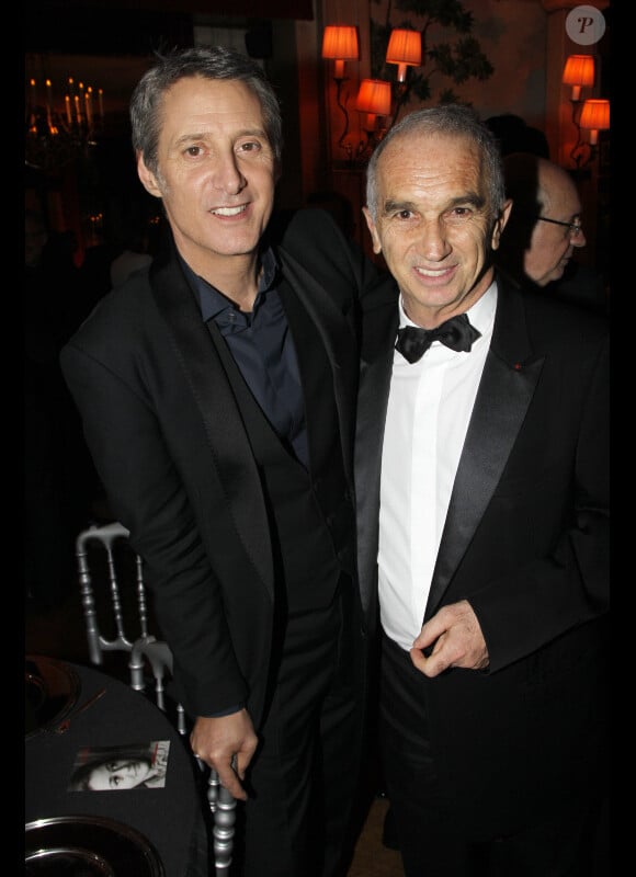 Antoine de Caunes et Alain Terzian lors de l'after-party de la 37ème cérémonie des César au Fouquet's, le 24 février 2012