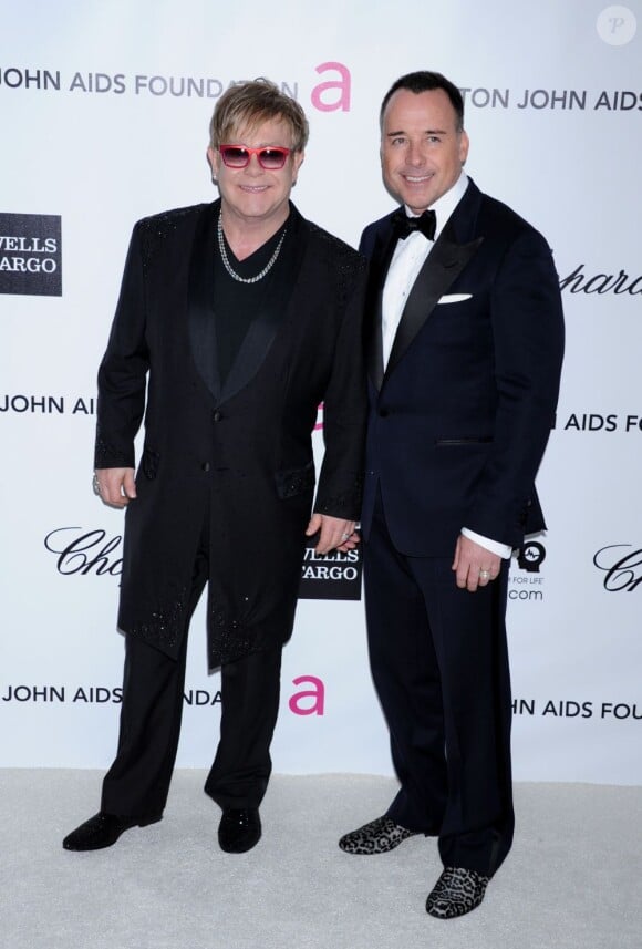 Elton John et son époux David Furnish lors de l'after-party des Oscars organisée par Elton John le 26 février 2012