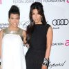 Kourtney Kardashian et sa soeur Kim lors de l'after-party des Oscars organisée par Elton John le 26 février 2012