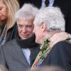 Guy Bedos et Jean-Loup Dabadie aux obsèques de Félicien Marceau, à Neuilly-sur-Seine, le mardi 13 mars 2012.