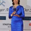 Superbe en bleu, la reine Silvia de Suède était l'une des lauréates de la soirée des Steiger Awards, distinguée dans la catégorie charité, le 17 mars 2011 à Bochum, en Allemagne.