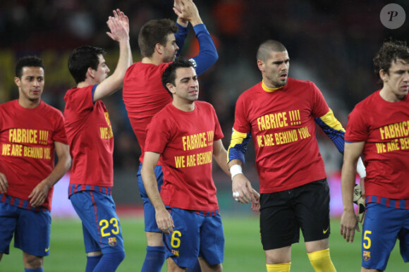 L'équipe du FC Barcelone rend hommage à Fabrice Muamba le 20 mars 2012, victime d'une crise cardiaque en plein match le 17 mars 2012 à Londres