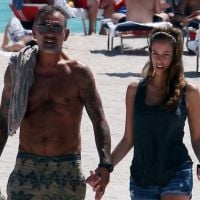 Christian Audigier : Avec sa belle Nathalie, tournée des boîtes et des plages