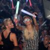 Paris Hilton fait la fêt lors de la soirée de son chéri DJ Afrojack à Miami le 24 mars 2012