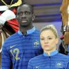 Mamadou Sakho et Laure Boulleau présentent le nouveaux maillot de l'équipe de France au manège du quartier des Célestins de la Garde Républicaine à Paris le 16 avril 2012