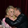 Jean-Roch rend son baiser à Pamela Anderson au VIP ROOM le 21 avril 2012 à Paris
