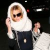 Lindsay Lohan prend un vol de nuit à LAX, Los Angeles, pour Washinton DC. Elle aurait manquait son premier vol originel car elle fait la fête... Le 27 avril 2012.