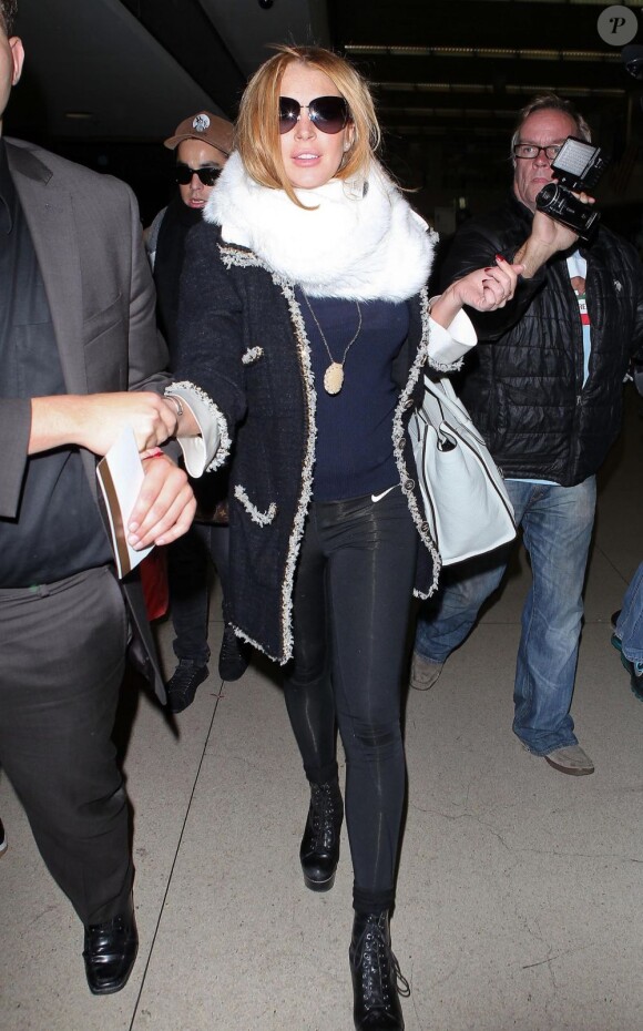 Lindsay Lohan prend un vol de nuit à LAX, Los Angeles, pour Washinton DC. Le 27 avril 2012.