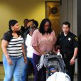  Les familles Hudson et Balfour quittent le tribunal après le verdict, à Chicago, le 11 mai 2012 