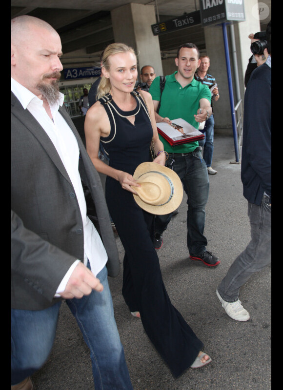 Diane Kruger arrive à l'aéroport de Nice le 15 mai 2012. Direction le festival de Cannes, pour assurer son rôle de membre du jury.