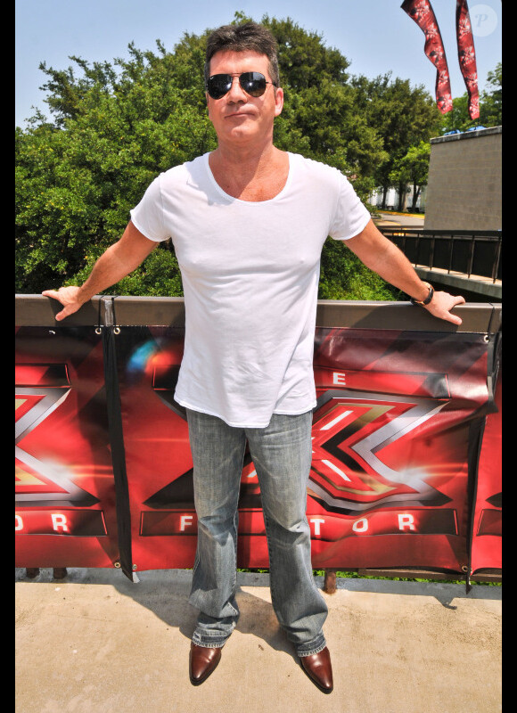 Simon Cowell, membre du jury de X Factor, arrive sur les auditions de X Factor, au Texas, le jeudi 24 mai 2012.