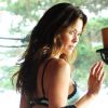 Brooke Burke, très sexy sur le shooting de sa nouvelle ligne de lingerie intiMINT. Los Angeles, avril 2012.