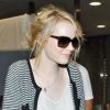 Emma Stone arrivant à l'aéroport de Tokyo pour la conférence de presse du film The Amazing Spider-Man le 12 juin 2012