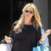 Molly Sims et son fils Brooks à Los Angeles, le 29 juin 2012.