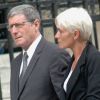Jean-Michel Larqué et sa femme le 21 juin 2012 lors des funérailles de Thierry Roland