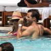David Charvet et sa femme Brooke Burke à la piscine à Miami, le 19 juillet 2012