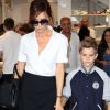 Victoria Beckham sort de chez Colette à Paris avec son fils Romeo le 23 juillet 2012
