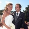 Ingrid Chauvin et son mari Thierry Peythieu lors leur mariage au Cap Ferret en août 2011
