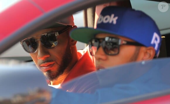 Lewis Hamilton au volant de sa McLaren MP4-12C à Cannes avec Swizz Beatz le 24 juillet 2012 pour le tournage du clip de ce dernier, Everyday is your birthday