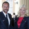 Le prince héritier Haakon de Norvège et la princesse Mette-Marit lors de la réception royale à Buckingham avant la cérémonie d'ouverture des JO de Londres le 27 juillet 2012.