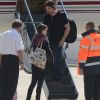 Anne Hathaway et Christian Bale quittant la France après la promotion avortée de The Dark Knight Rises, le 21 juillet 2012