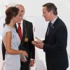 Kate Middleton a été accueillie par le Premier ministre David Cameron lors de la réception Creative Industries organisée par le Founders Forum et pour la campagne gouvernementale GREAT, à l'Académie royale des arts de Londres, le 30 juillet 2012, en marge des JO.