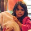 Suri Cruise, une poupée dans les bras, fait du shopping dans les rues de New York, le 20 août 2012