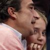 Mary-Kate Olsen et Olivier Sarkozy lors d'un match de basket en avril 2012 à New York