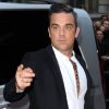 Robbie Williams à son arrivée à la Royal Opera House pour les GQ Men of the Year Awards. Londres, le 4 septembre 2012.