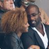 Teddy Riner et sa compagne Luthna lors du match du Paris Saint-Germain face à Toulouse (2-0) le 14 septembre 2012 à Paris