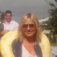 Photo de Geri Halliwell avec un serpent postée sur sa page Facebook officielle.
