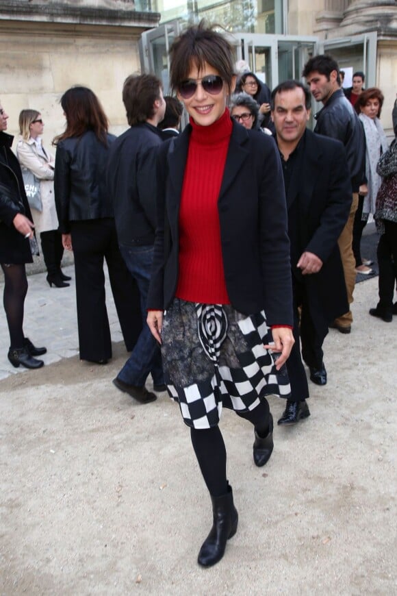 Sophie Marceau assistait au défilé Agnès B. printemps-été 2013 au musée du Jeu de Paume. Paris, le 2 octobre 2013.