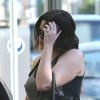 Khloé Kardashian tente de faire profil bas en se rendant dans une salle de sport. Miami, le 10 octobre 2012.