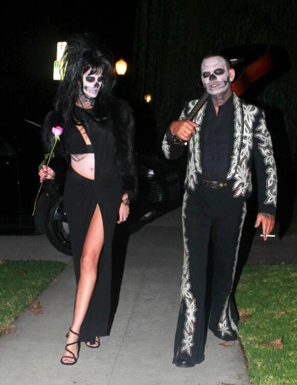 Christian Audigier et sa compagne Nathalie Sorensen : déguisés pour se rendre à la soiree d'Halloween de Rihanna au Manoir Greystone à West Hollywood, le 31 octobre 2012.