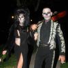 Christian Audigier et sa compagne Nathalie Sorensen se rendent à la soiree d'Halloween de Rihanna au Manoir Greystone à West Hollywood, le 31 octobre 2012.