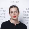 Charlotte Casiraghi arrive à la soirée Chanel pour l'exposition La Petite Veste Noire le 8 novembre 2012 à Paris.