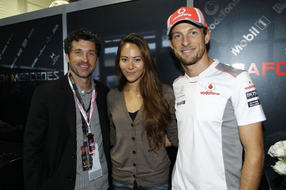 Patrick Dempsey, Jensen Button et la compagne de ce dernier Jessica Michibata dans le paddock du Grand Prix des Etats-Unis à Austin au Texas le 18 novembre 2012