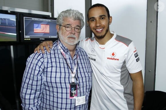 George Lucas et Lewis Hamilton dans le paddock du Grand Prix des Etats-Unis à Austin au Texas le 18 novembre 2012