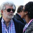 George Lucas et sa compagne Mellody Hobson dans le paddock du Grand Prix des Etats-Unis à Austin au Texas le 18 novembre 2012