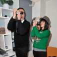 Nikos Aliagas et Alizée à la soirée de lancement de l'appareil photo Olympus 'Pen Lite' à la boutique Ephemere Olympus à Paris le 6 Decembre 2012.