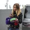 Jessica Alba dans un look rock pour aller travailler. Le 12 décembre 2012 à Los Angeles