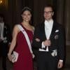 La princesse Victoria de Suède et le prince Daniel arrivant pour le dîner de gala en l'honneur des lauréats des prix Nobel, donné le 11 décembre 2012 dans la salle Mer Blanche du palais Drottningholm, à Stockholm.