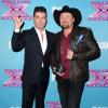 Simon Cowell et Tate Stevens le soir de la grande finale de X Factor saison 2, à Los Angeles le 20 décembre 2012.