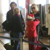 Sharon Stone, son petit ami Martin Mica et ses fils Roan, Laird et Quinn à l'aéroport de Los Angeles, le 23 decembre 2012.