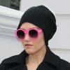 Gwen Stefani, son mari Gavin Rossdale et leurs fils Zuma et Kingston quittent leur domicile londonien pour se rendre à l'aéroport. Le 4 janvier 2013. La chanteuse se cache derrière de larges lunettes fluo.