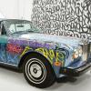 Rolls-Royce Corniche de 1984 customisée par le graffeur JonOne mise en vente en janvier 2013 par Eric Cantona au profit de la Fondation Abbé Pierre. Acquise par Sébastien Bazin, elle est désormais exposée à l'Hôtel Dassault, sur les Champs-Elysées.